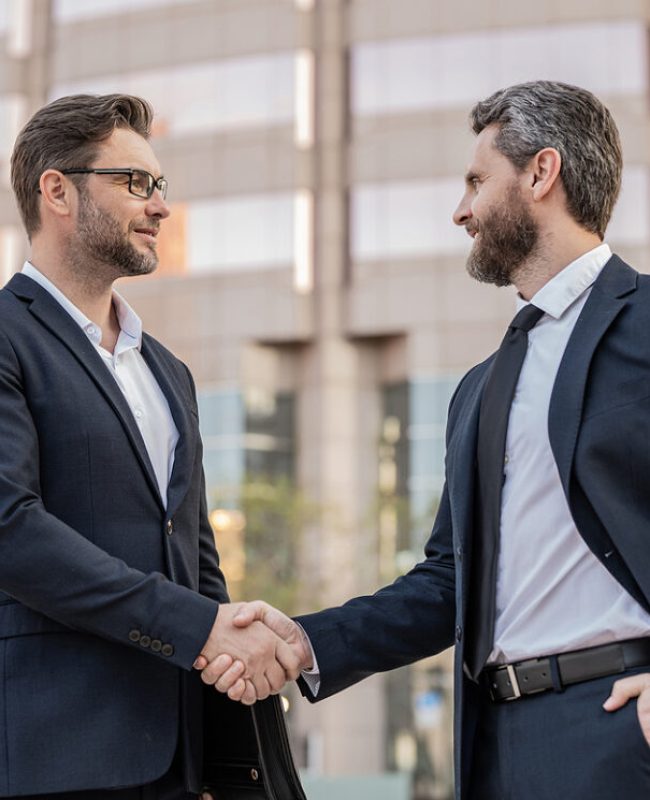 bigstock-Happy-Two-Businessmen-In-Suit-478368971-1536x745